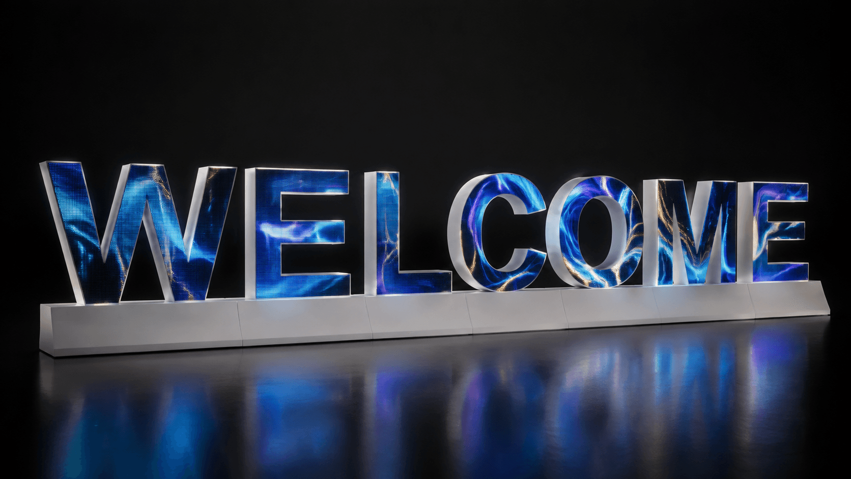 WELCOME video-display letters with rich blue and gold content